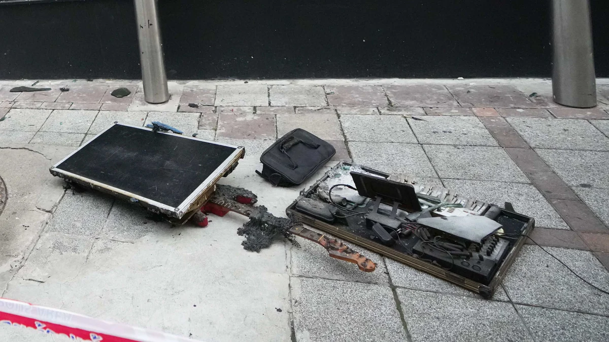 The band playing when a Bangkok bar caught fire mourns its members among the 33 dead