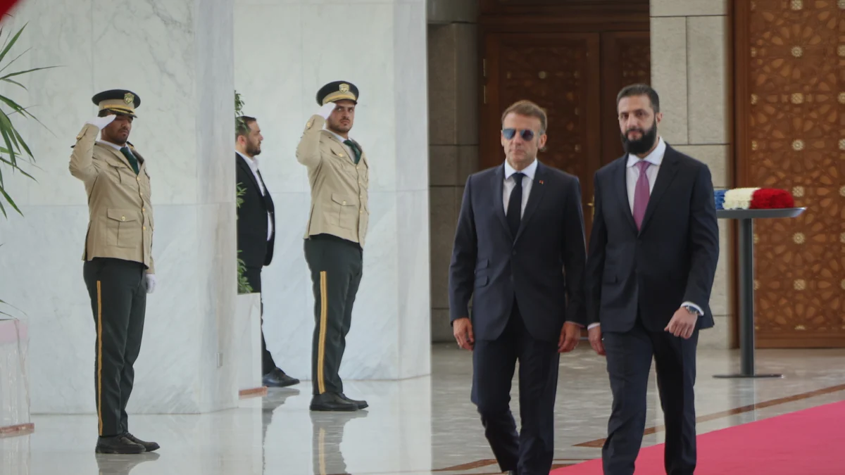 Explosions rock Damascus, wounding 4, as French President Macron visits Syria