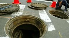 New York police investigate videos of men emerging from city's sewer system