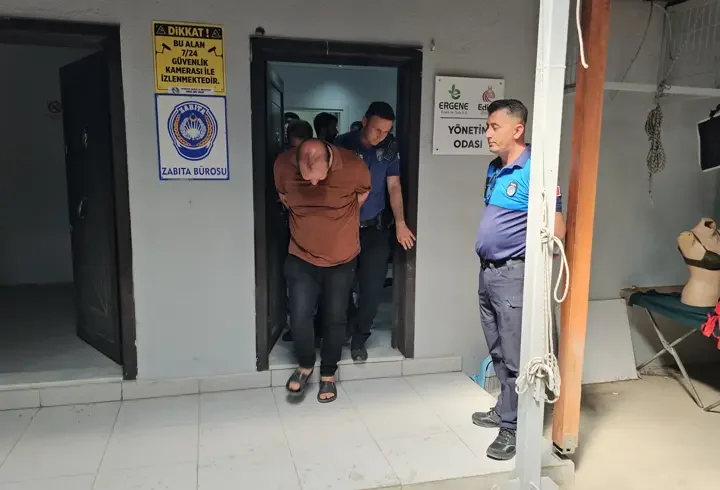 Pazar yerinde kadınların görüntülerini çeken şüpheliye gözaltı