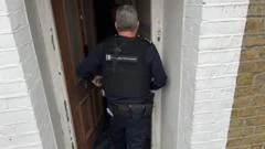 Two people arrested after asylum investigation