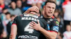 Six-try Wigan shut out St Helens to reach final