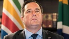 Leader of South Africa's second biggest party wants his predecessor sacked as minister