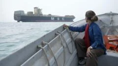 On the Strait of Hormuz, finds seized ships and shark fishermen as uneasy calm returns