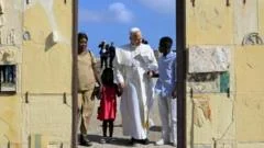 Pope urges Europe to do more for migrants while visiting gateway island
