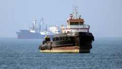 Iran warns against complying with US sanctions as Gulf attacks reported