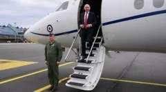 RAF jet carrying defence secretary has signal jammed near Russian border