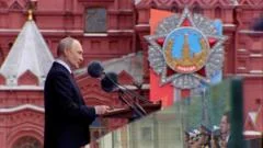 Putin denounces Nato at scaled back Victory Day parade