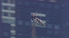 Watch: Two people climb to highest point of Empire State Building
