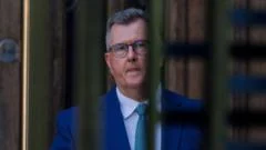Donaldson's first night in prison as downfall shakes NI politics