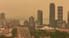 Orange haze from Canada wildfires seen in Ontario and northern US