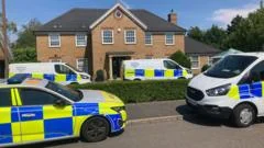 International manhunt after mother and two children found dead at home