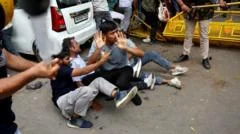 Why are thousands of people protesting in Delhi?