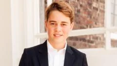Prince George poses in suit for new photo as he becomes a teenager