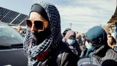 IS families in Syria have booked tickets home to Australia, minister says