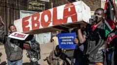 Kenyan police fire tear gas at protest against US Ebola quarantine centre plan