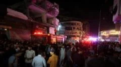 Three killed and dozens injured in Israeli strike on Gaza City, medics and witnesses say