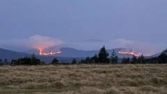 Wildfire still burning across four miles as helicopter waterbombs Cairngorms