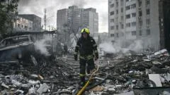Nine killed in Russian strikes on Kyiv on eve of Nato summit in Turkey